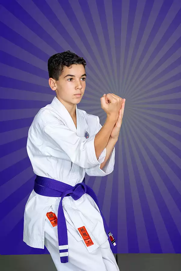KTK Martial Arts student performing a purple belt kata. Sport photography by Jeffrey Meyer